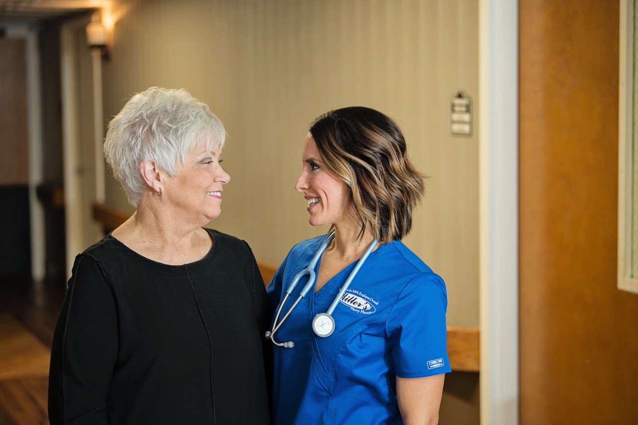 Nurse with nursing home patient